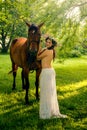 Pretty nude woman with horse Royalty Free Stock Photo