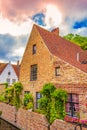 Pretty old canalside house Bruges city view at summer day Belgium Royalty Free Stock Photo