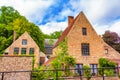 Pretty old canalside houses Bruges city view at summer day Belgium Royalty Free Stock Photo