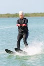 Pretty Older Lady Water Skiing Royalty Free Stock Photo