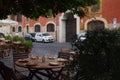 Rome, Italy: Pretty outdoor cafe table setting in charming neighborhood of Trastevere. Al fresco restaurant dining setup. Royalty Free Stock Photo