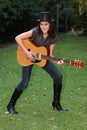 Pretty Outdoor Guitar Woman Royalty Free Stock Photo