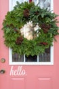 Pretty painted door with holiday wreath