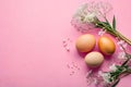 Pretty Pastels: Gypsophila and Easter Eggs on a Top-View Pink Background