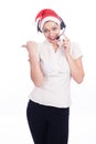 Pretty phone operator in Santa hat isolated over white Royalty Free Stock Photo