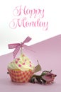 Pretty Pink Cupcake With Pale Pink Silk Rose Bud On Pink Background With Happy Monday Sample Text