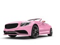 Pretty pink modern luxury convertible car - low angle shot Royalty Free Stock Photo