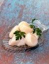 Pretty plate of Raw, uncooked sea scallops Royalty Free Stock Photo