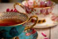 Pretty porcelain teacup with black tea
