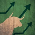 Pretty portrait bull and a upward arrow indicating the up of the stock market green background, stock market up and bull concept. Royalty Free Stock Photo