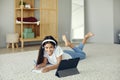 Girl studying online using modern tech at home Royalty Free Stock Photo