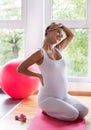 Pregnant woman exercising at home Royalty Free Stock Photo