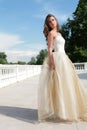 Pretty princess in white-golden gown Royalty Free Stock Photo