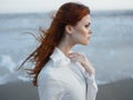 pretty red-haired woman in white dress lifestyle fresh air fashion travel