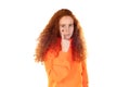 Pretty redhead woman wearing a orange t-shirt standing over white background Pointing to the eye watching you gesture Royalty Free Stock Photo