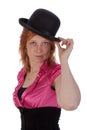 Pretty redhear girl with a bowler