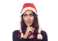 Pretty Santa woman saying shh