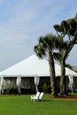 Pretty scene of wedding tent in tropical setting