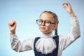Pretty Schoolgirl In Glasses Raise Hands Copyspace