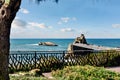 Pretty seaside landscape of Biarritz and its famous rock of the Virgin at sunset Royalty Free Stock Photo