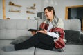 pretty senior woman using tablet computer at home. Royalty Free Stock Photo