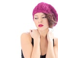 Pretty serious woman wearing pink hat