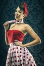 Pretty woman in red vintage polka dot dress