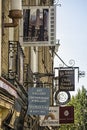 Pretty signs hanging above shops in the City Centre