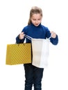 Pretty small girl with shopping bags Royalty Free Stock Photo