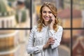 Pretty smiling caucasian business woman talking on mobile phone. Royalty Free Stock Photo