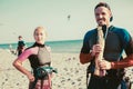 Pretty smiling Caucasian woman kitesurfer enjoying summertime Royalty Free Stock Photo