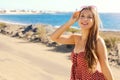 Pretty smiling fashion girl looking at camera outdoor. Happy laughing lovely young tourist woman looking excited at camera Royalty Free Stock Photo