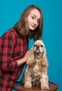 Pretty smiling girl with american spaniel Royalty Free Stock Photo