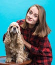 Pretty smiling girl with american spaniel Royalty Free Stock Photo