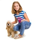 Pretty smiling girl with american spaniel Royalty Free Stock Photo