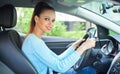 Pretty smiling girl driving a car Royalty Free Stock Photo