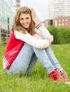 Pretty smiling girl relaxing outdoor Royalty Free Stock Photo