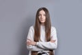 Pretty smiling joyfully female with dark hair, dressed casually, looking with satisfaction at camera, being happy. Studio shot of Royalty Free Stock Photo