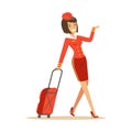 Pretty smiling stewardess carrying her luggage