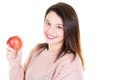 Pretty smiling young woman eating red apple Royalty Free Stock Photo