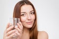 Pretty smiling young woman with glass of water Royalty Free Stock Photo