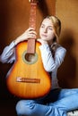 Young woman playing guitar Royalty Free Stock Photo