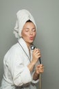 Pretty Spa woman taking a shower and singing Royalty Free Stock Photo