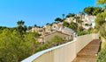 Pretty Spanish white residential houses, modern villas view against blue sky