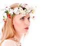 Pretty spring girl with wreath on head