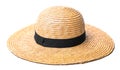 Pretty straw hat with a black strip on white background beach hat top view