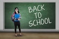 Pretty student with text of Back to School Royalty Free Stock Photo