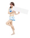 Pretty sunshine girl standing and holding a board Royalty Free Stock Photo