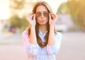 Pretty sweet girl in sunglasses