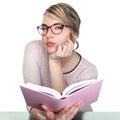 Pretty teacher with book look at camera